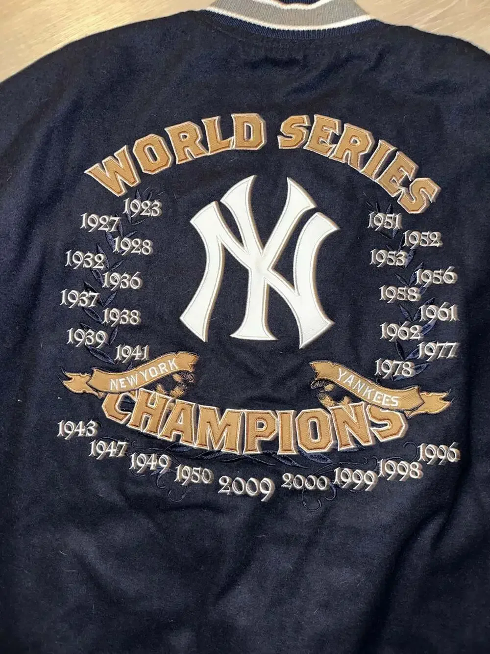 New York Yankees MLB World Series Champions Varsity Jacket with Patchwork Sleeve